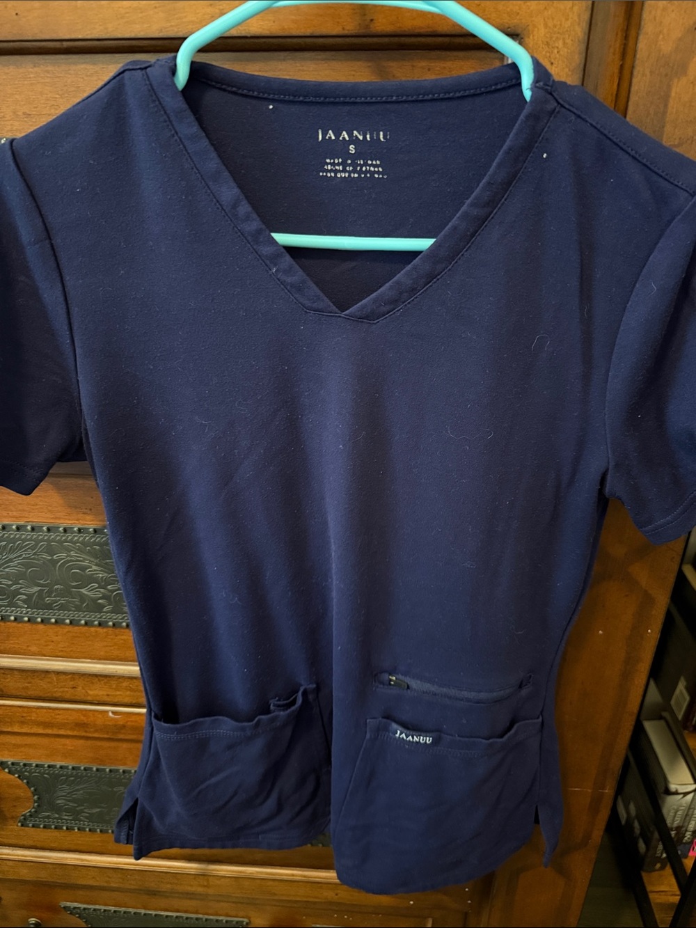 Jaanuu Navy V-Neck Scrub Top with Front Pockets pant set joggers